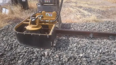 Ballast Broom Rail Attachment